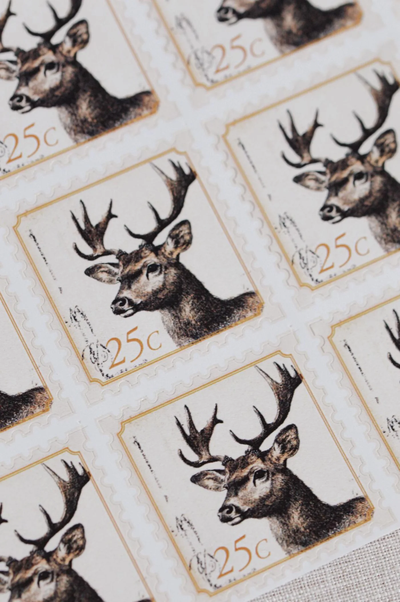Close-up of illustrated reindeer decorative stamp designs